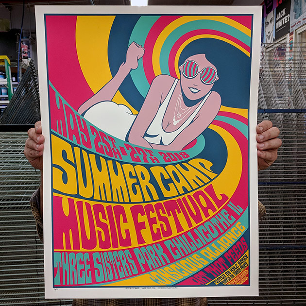 Summer Camp Music Festival 2018 poster being held up for a photo at Baker Prints